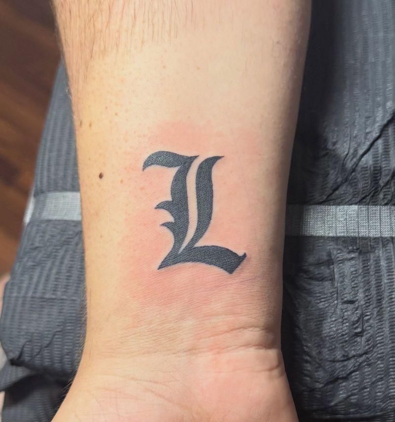 Blackletter L from Death Note on a wrist