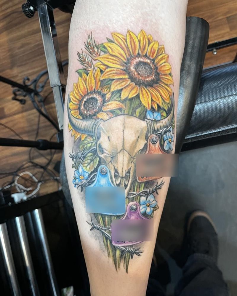 Sunflowers, a bull skull and cattle ear tags, color