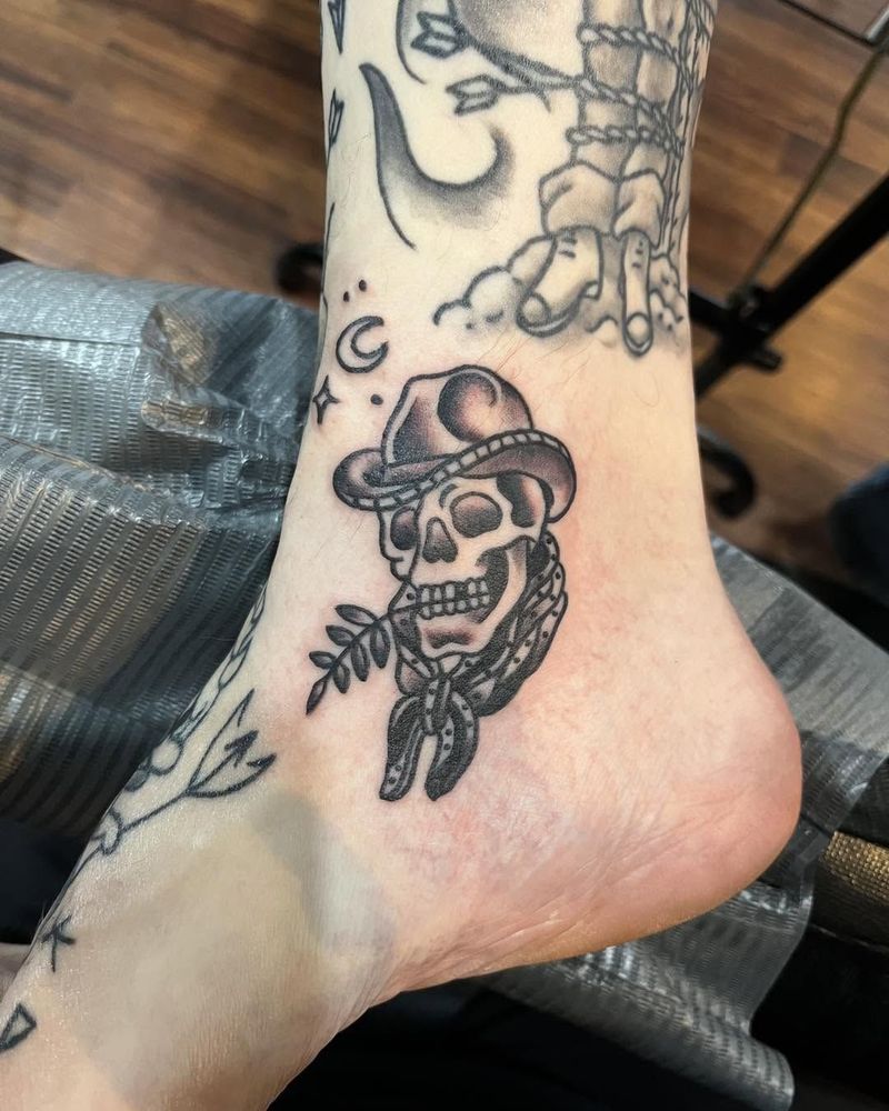 Skeleton in a cowboy hat on an ankle, black and grey