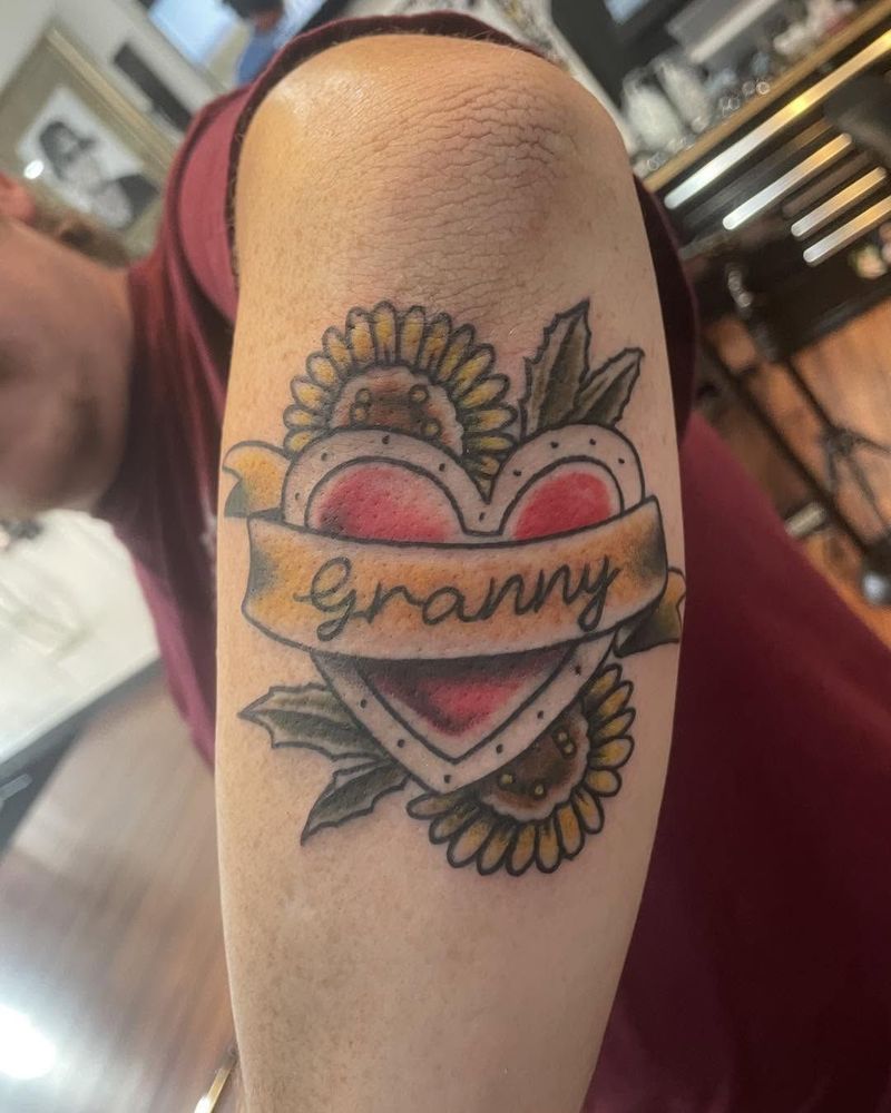 Heart with a Granny banner and sunflowers on an elbow